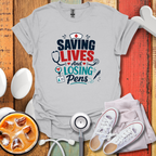 Saving Lives & Losing Pens T-Shirt